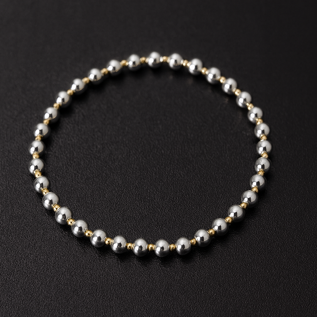 Silver bracelet on a black background