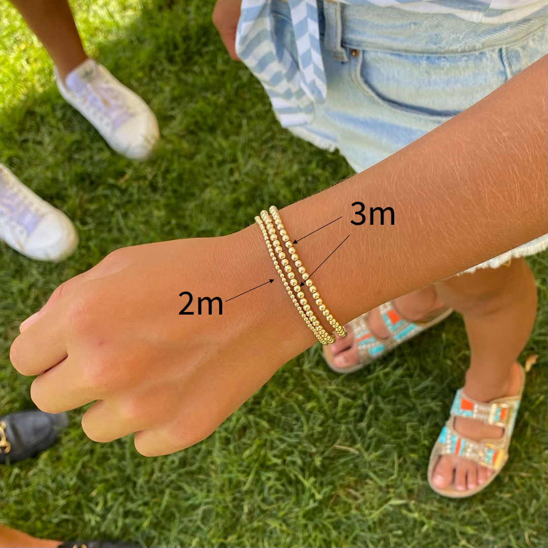 2mm vs 3mm Gold Ball Bracelet on wrist