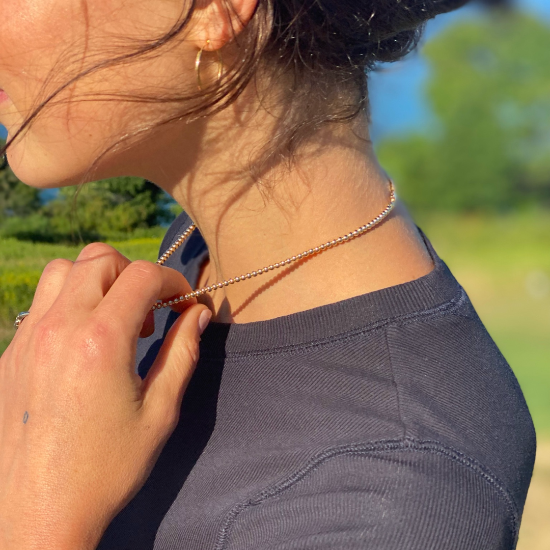 3MM Gold Ball Necklace on neck