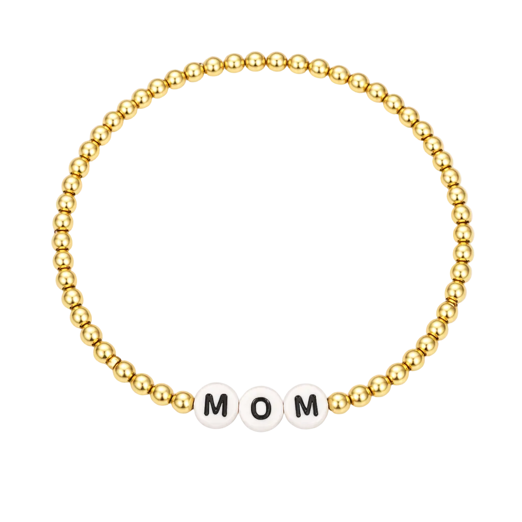 Gold beaded bracelet with a small white bead displaying 'MOM' on a white background