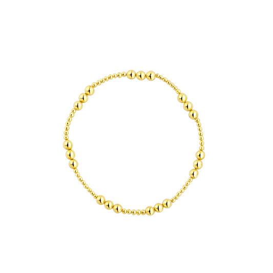 Gold bracelet on a white background