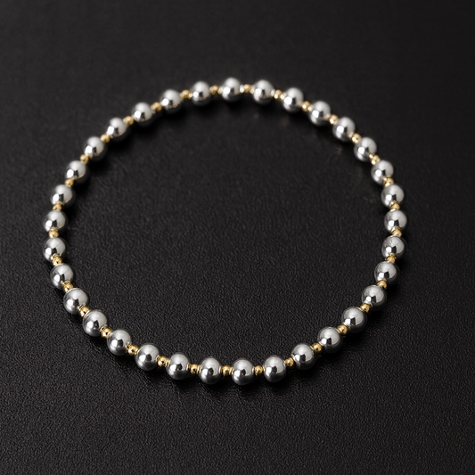 Silver bracelet on a black background