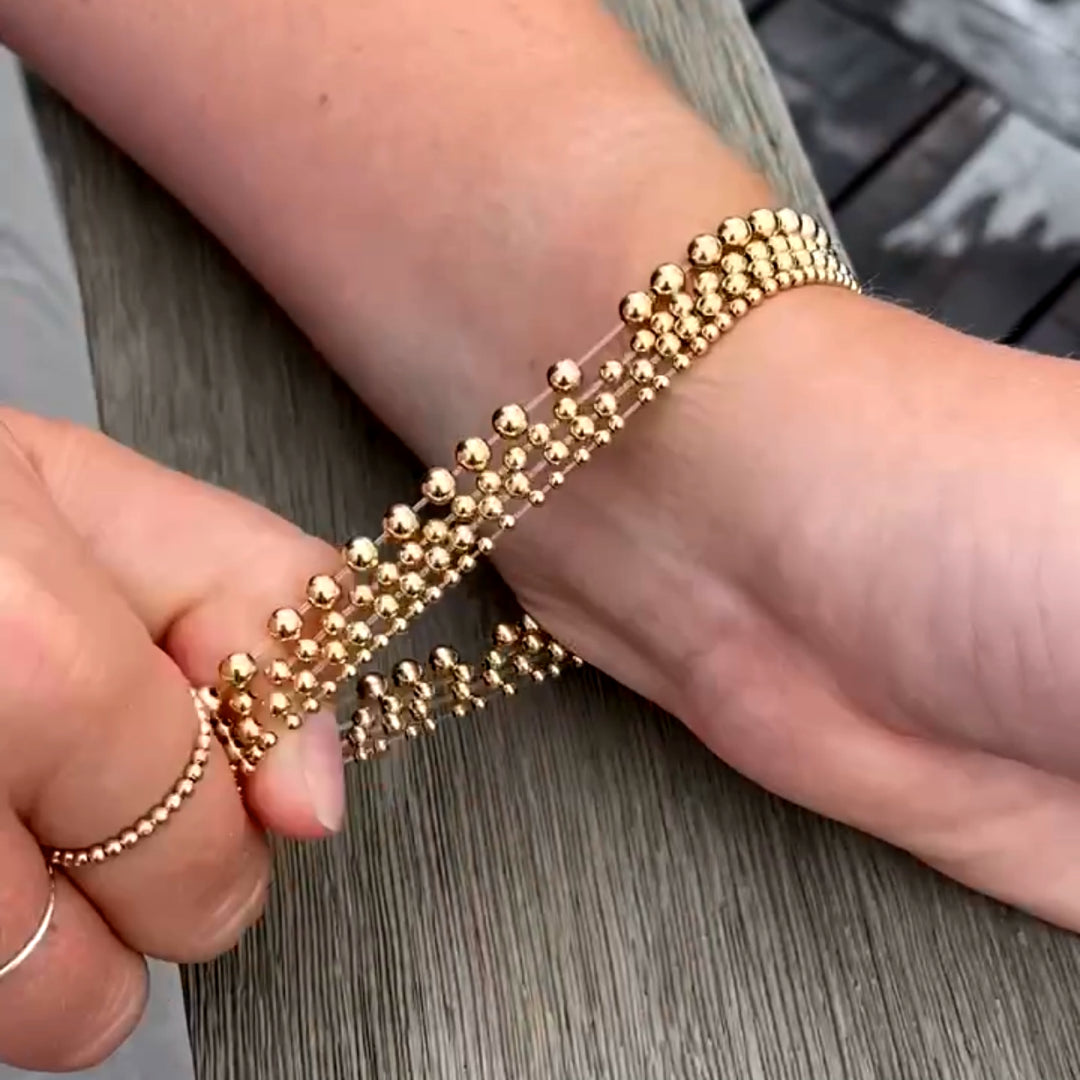 stretchy gold ball bracelets